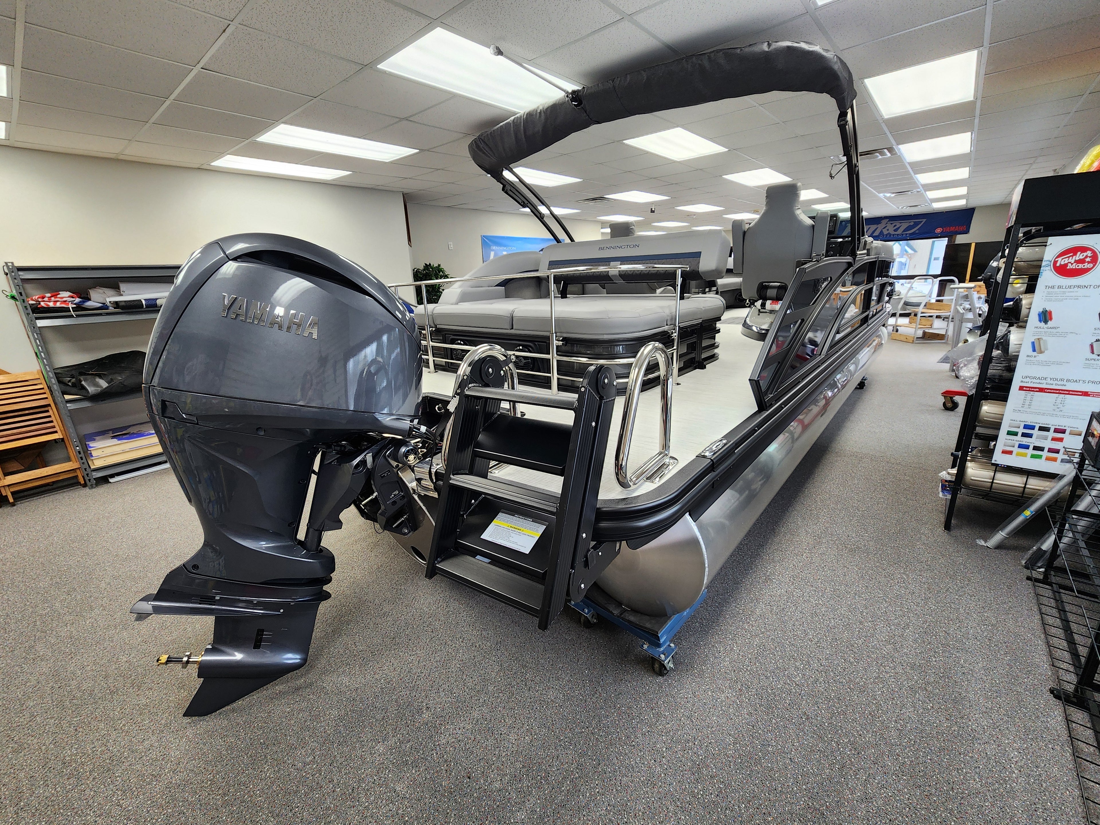 2026 New Bennington 24MSB Pontoon / Tritoon For sale near Charlevoix with 200hp Yamaha Outboard. At a Marina, Blue and Silver